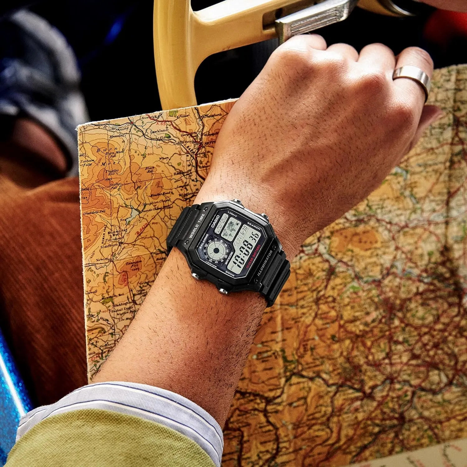 Casio AE1200WH Series | Men’s Digital Watch | 100M WR | Multi Alarms | 100 SEC Stopwatch | Countdown Timer | World Map for World Time | LED Light | LC Analog Display | 10 Year Battery
