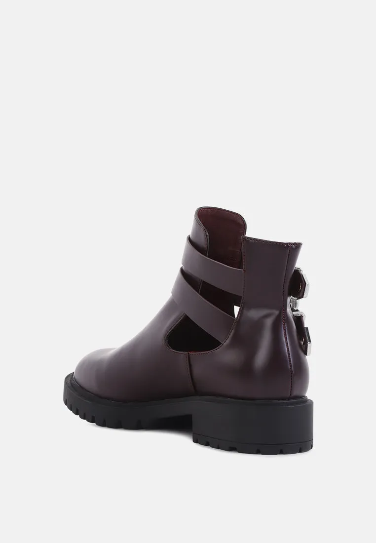 erner adjustable cut-out buckle boots